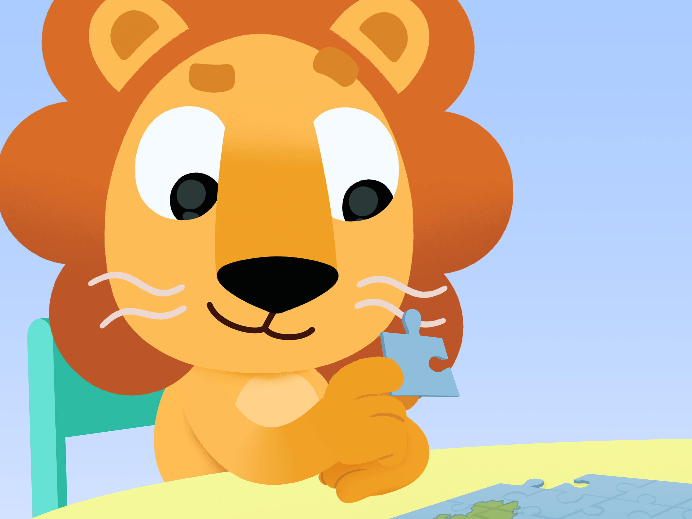 Tom the Lion enjoying a jigsaw puzzle